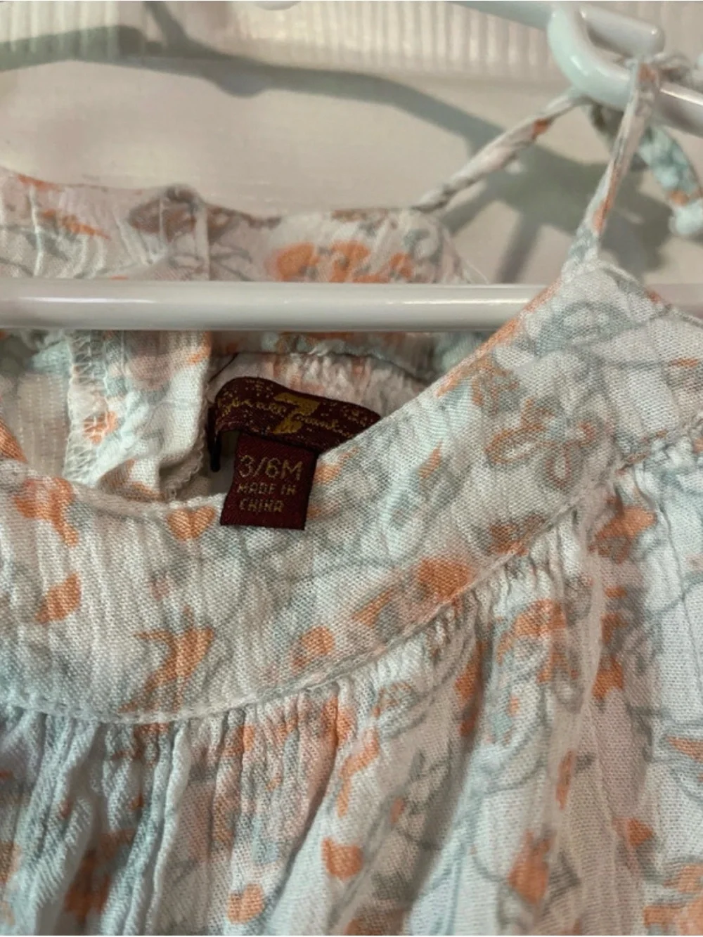 7 For All Mankind Cream Romper with Orange Floral Print